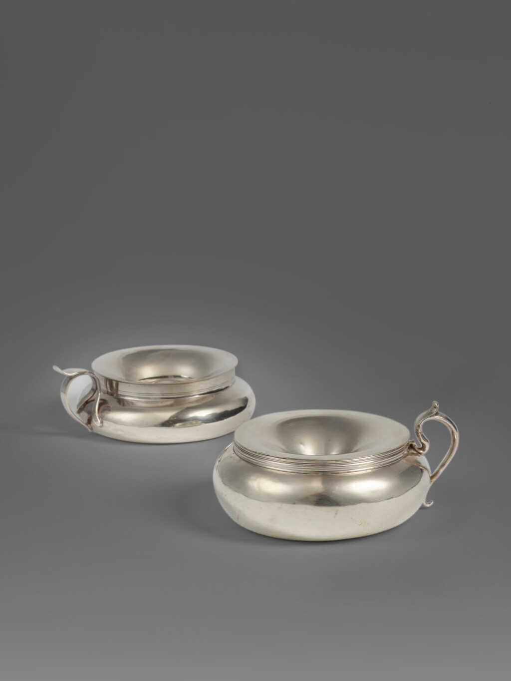 View full screen - View 1 of Lot 741. Two Silver Spittoons, Portuguese and Italian, Late 18th to Early 19th Century.