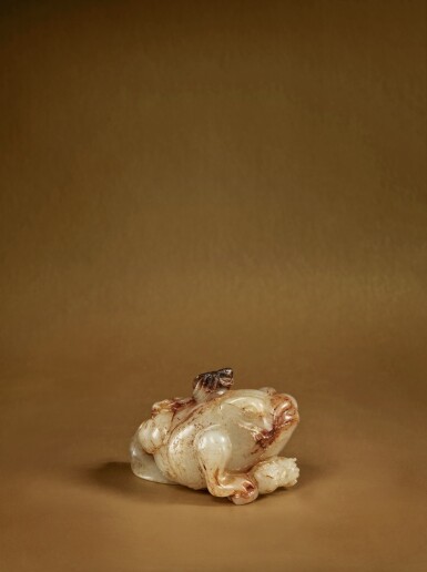 View full screen - View 1 of Lot 129. A pale green and russet jade 'Five Poisons' vessel and cover, Ming dynasty .