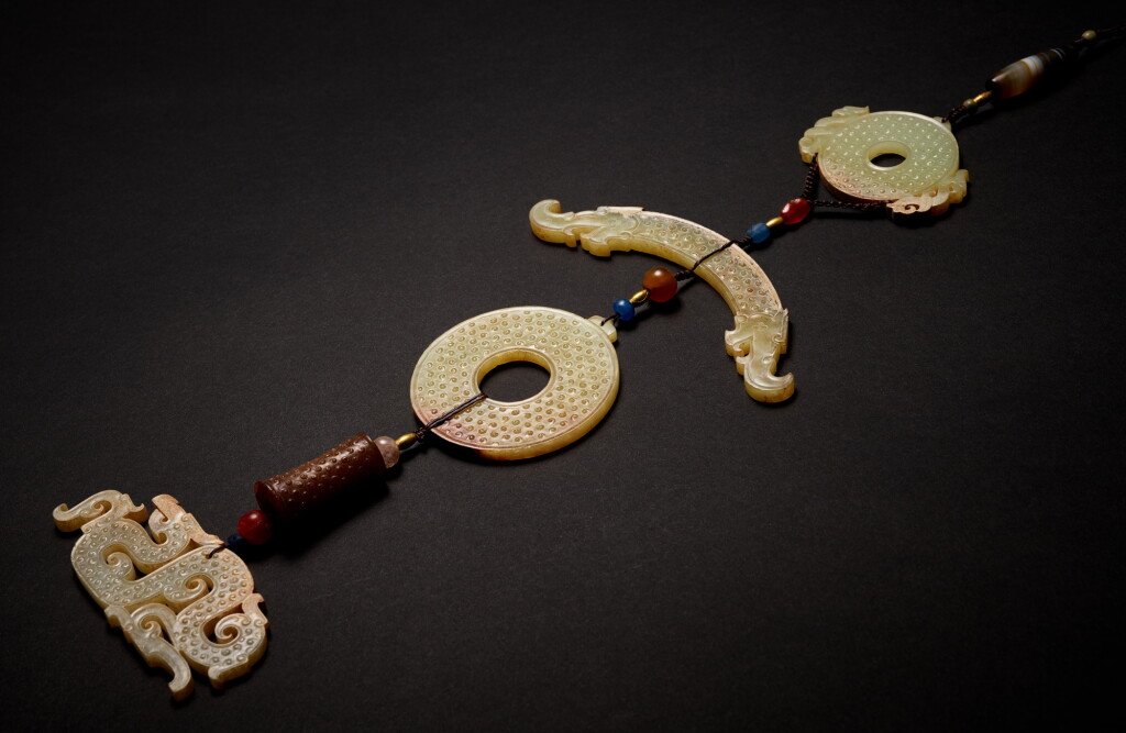 View full screen - View 1 of Lot 932. An exceptionally rare group of five jade pendants, Eastern Zhou dynasty, Warring States period | 東周戰國 玉組珮一組五件.