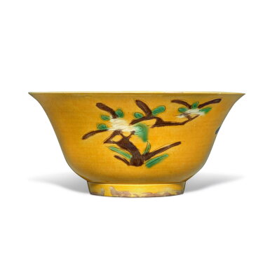 View full screen - View 1 of Lot 735. A yellow-ground green and aubergine-enameled biscuit 'floral' bowl, Qing dynasty, Kangxi period | 清康熙 素三彩花卉紋盌.