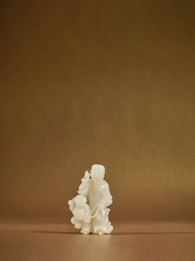 View full screen - View 1 of Lot 133. A white jade 'immortal and boy' group, Qing dynasty, Qianlong period .