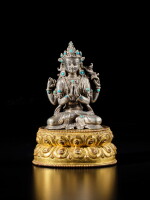 A silver and gilt-copper figure of Shadakshari, Tibet, 15th century