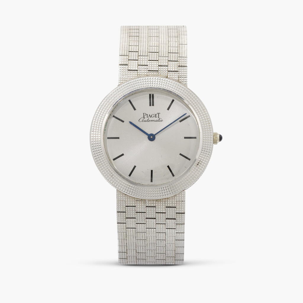 View full screen - View 1 of Lot 233. Reference 12611 G4 | A white gold automatic wristwatch with integrated bracelet | Circa 1961.