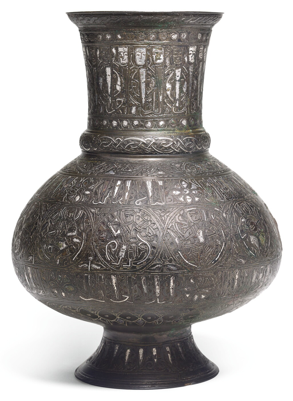 View full screen - View 1 of Lot 216. A SILVER-INLAID BRASS JUG, MESOPOTAMIA, MOSUL, FIRST HALF 13TH CENTURY.