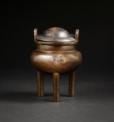 View full screen - View 1 of Lot 128. A gold and silver filigree inlaid 'dragon' incense burner Qing dynasty, 18th century | 清十八世紀 銅錯金銀冲天耳鼎爐 《玉堂石叟》款.