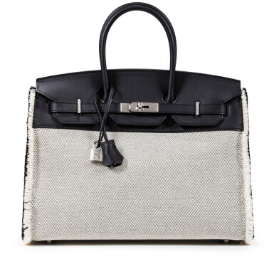 View full screen - View 1 of Lot 682. Limited Edition Black Swift and Ecru Twill H Canvas Fray Fray Birkin 35 Palladium Hardware, 2022.