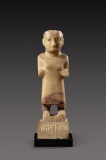 A South Arabian Alabaster Figure of a Woman, Qataban, 3rd Century B.C./1st Century A.D.