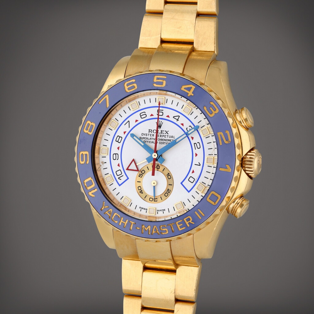 View full screen - View 1 of Lot 150. Reference 116688M Yacht-Master II | A yellow gold automatic regatta chronograph wristwatch with bracelet, Circa 2015.