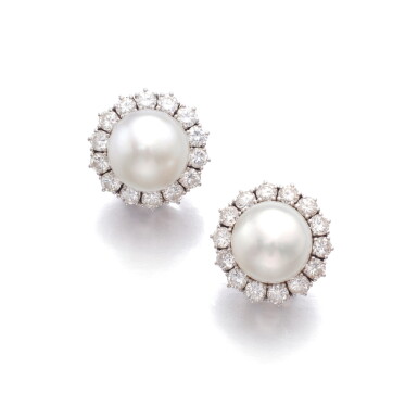 View full screen - View 1 of Lot 986. Pair of cultured pearl and diamond ear clips.