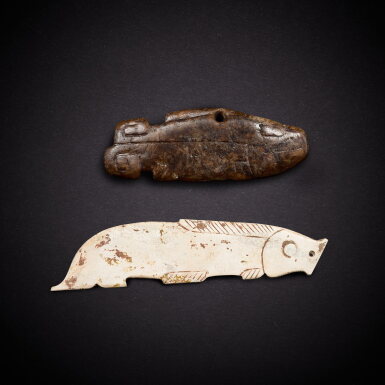 View full screen - View 1 of Lot 6818. A calcified jade 'fish' pendant, Western Zhou dynasty, and a jade 'fish' pendant, Ming dynasty or earlier | 西周 玉魚 及 明或更早 玉魚.