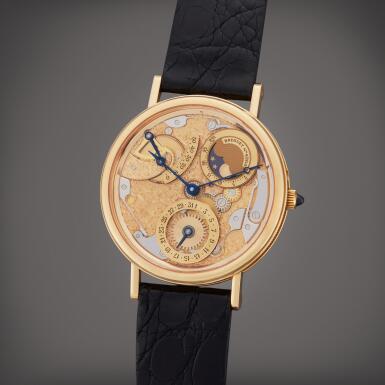 View full screen - View 1 of Lot 52. Reference 3135 | A yellow gold semi-skeletonized automatic wristwatch with date, moon phases, and power reserve indication, Circa 1995.