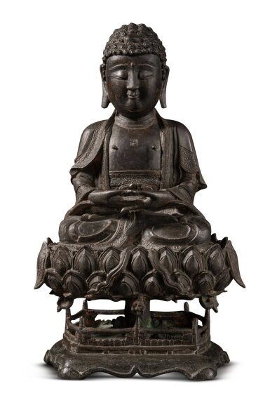 View full screen - View 1 of Lot 728. A bronze seated figure of Buddha, Late Ming dynasty | 明末 銅佛坐像.