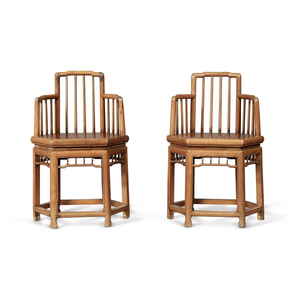 View full screen - View 1 of Lot 748. A pair of elm wood hexagonal spindleback armchairs, Qing dynasty, 19th century | 清十九世紀 櫸木六邊形梳背椅一對.