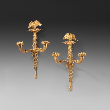 View full screen - View 1 of Lot 50. A pair of two tones gilt-bronze wall-lights, Louis XVI, circa 1788, probably delivered for Louis XVI by Daguerre | Paire d'appliques au caducée en bronze doré d'époque Louis XVI, probablement livrées par Daguerre pour Louis XVI, vers 1788.