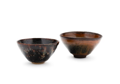 View full screen - View 1 of Lot 29. A Jian 'hare's-fur' bowl and a 'Jizhou' 'papercut' bowl Song dynasty | 宋 建窰兔毫紋盞及吉州窰黑釉剪紙貼花卉紋一組兩件.