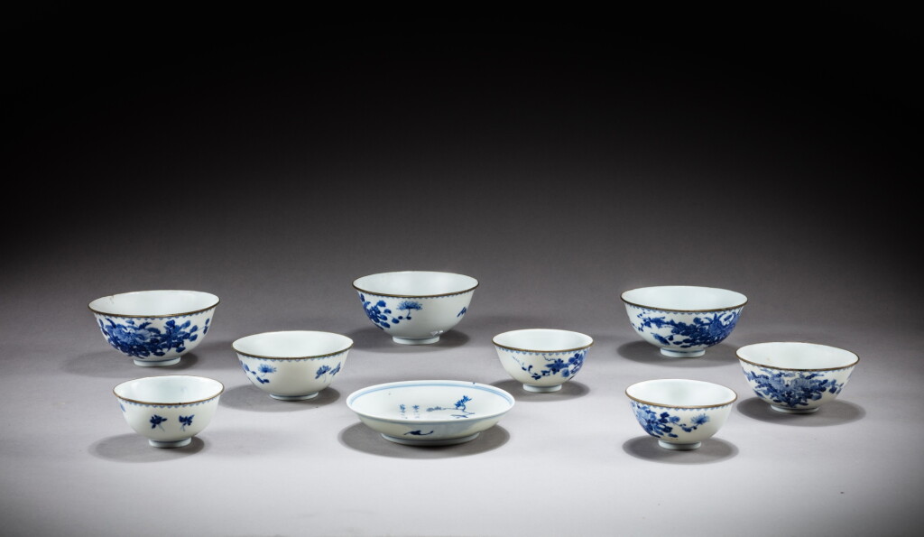 View full screen - View 1 of Lot 219. A set of eight blue and white bowls and a blue and white saucer, Marks and period of Guangxu | 清光緒 青花花蝶紋盌一組八件及青花花鳥紋小盤 《大清光緒年製》款.