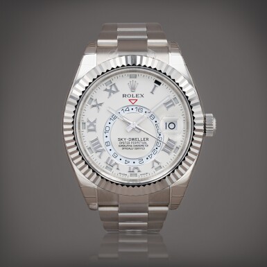 View full screen - View 1 of Lot 396. Sky-Dweller 'stickered', reference 326939 Montre bracelet en or blanc à quantième annuel, double fuseau horaire et date | White gold annual calendar and dual time zone wristwatch with date and bracelet Vers 2015 | Circa 2015.