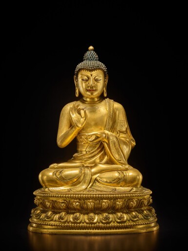 View full screen - View 1 of Lot 60. A large gilt-bronze figure of Dipankara Buddha, Qing dynasty, Kangxi period | 清康熙 銅鎏金燃燈佛坐像.