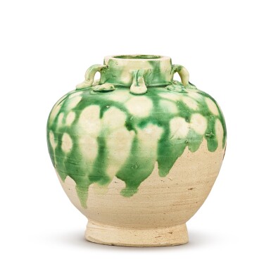 View full screen - View 1 of Lot 318. A green-splashed appliqué-decorated jarlet, Tang dynasty 唐 綠釉貼花四繫小罐.