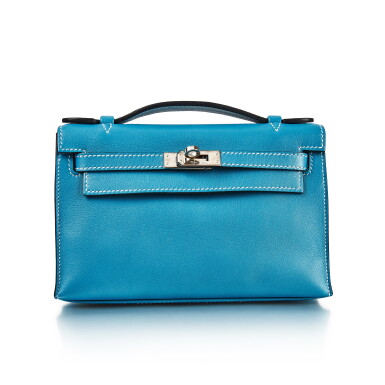 View full screen - View 1 of Lot 8334. Bleu Jean Swift Kelly Pochette Palladium Hardware, 2009 | 愛馬仕牛仔藍色 Swift 小牛皮 Kelly Pochette包,配鍍鈀金屬件,2009年.