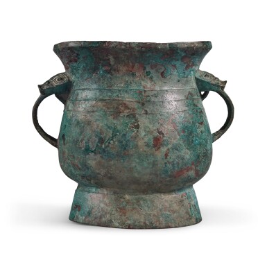 View full screen - View 1 of Lot 237. A very rare inscribed archaic bronze ritual handled vessel (Hu), Late Shang dynasty | 商末 亞壺.
