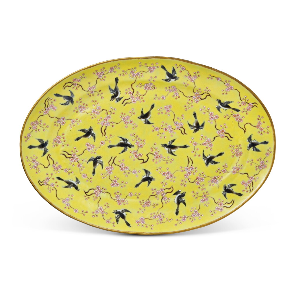 View full screen - View 1 of Lot 575. A yellow-ground famille-rose 'magpie and prunus' oval dish, Qing dynasty, Tongzhi period | 清同治 黃地粉彩喜上眉梢紋盤 《吉祥如意》款.