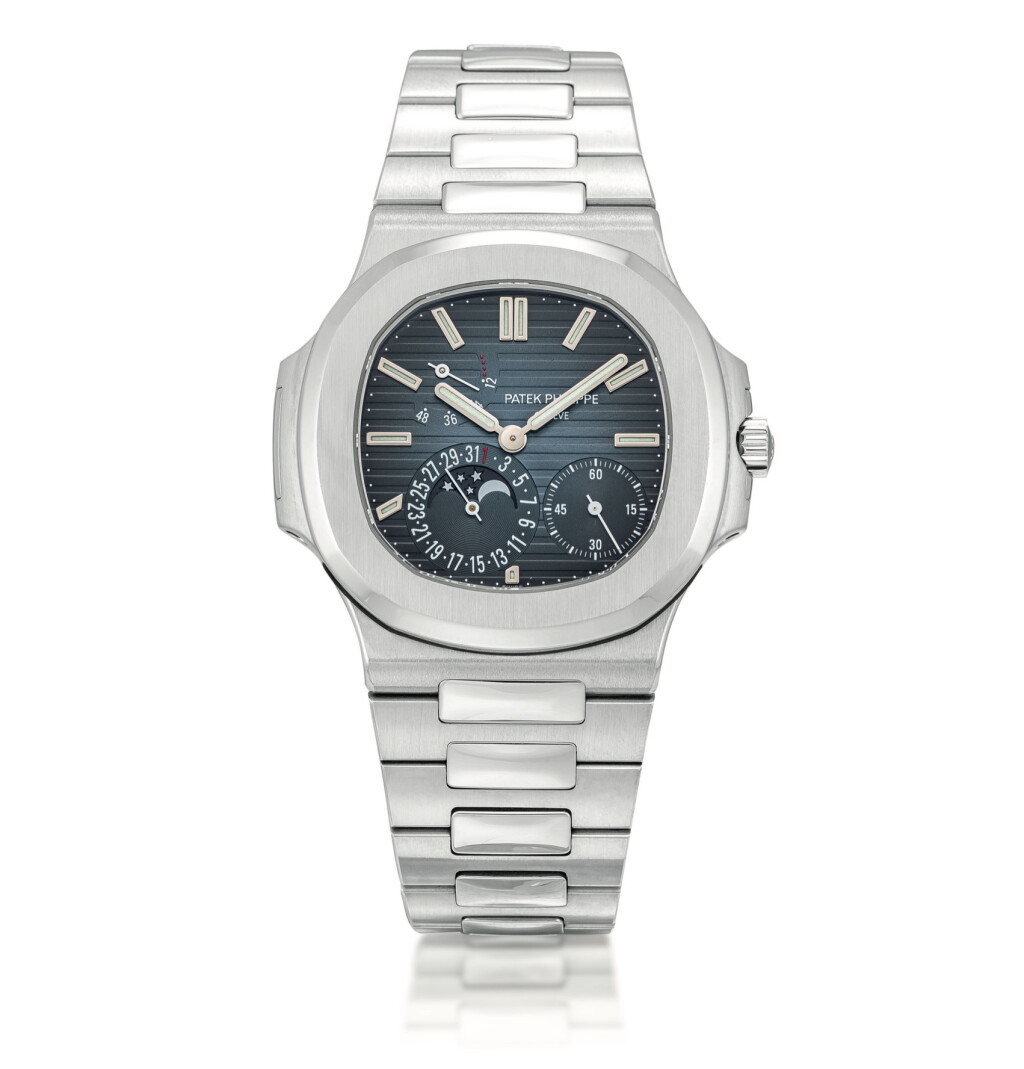 View full screen - View 1 of Lot 2080. Patek Philippe | Nautilus, Reference 5712, A stainless steel bracelet watch with date, moon phases and power reserve indication, Circa 2007 | 百達翡麗 | Nautilus 型號5712 精鋼鏈帶腕錶,備日期、月相及動力儲備顯示,約2007年製.