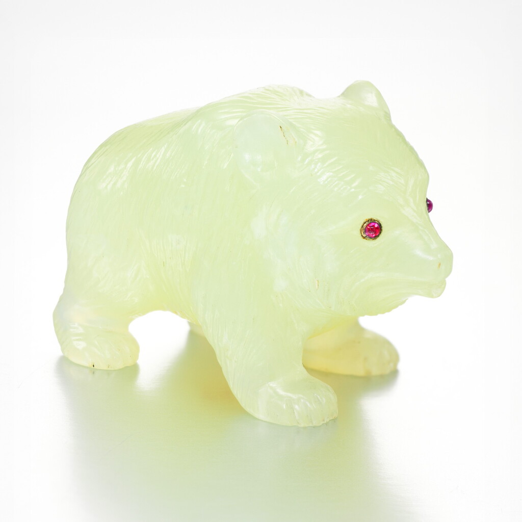 View full screen - View 1 of Lot 7. A FABERGÉ JEWELLED BOWENITE MODEL OF A STRIDING BEAR CUB, ST PETERSBURG, CIRCA 1900.