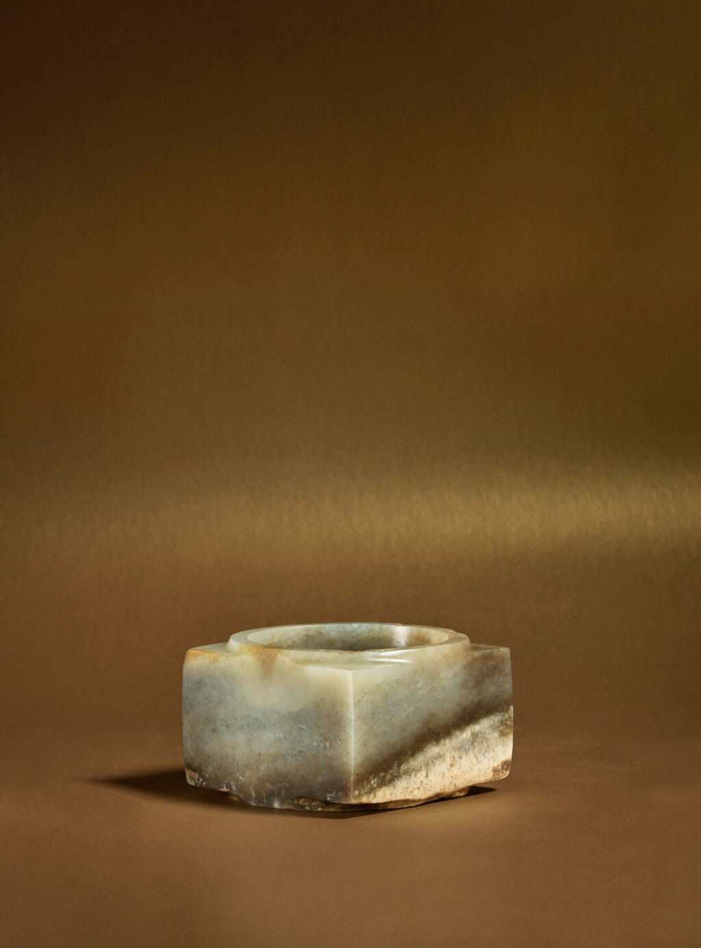 View full screen - View 1 of Lot 81. An archaic pale green and brown jade cong, Neolithic period, Qijia culture.
