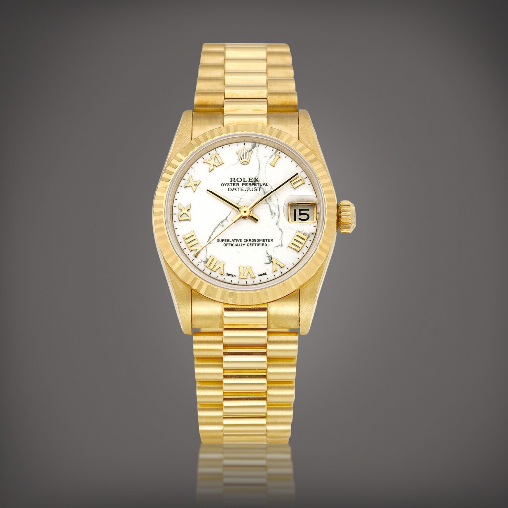 View full screen - View 1 of Lot 2230. DateJust, Reference 68278 | A yellow gold wristwatch with date, howlite dial and bracelet, Circa 1997 | 勞力士 | DateJust 型號68278 | 黃金鏈帶腕錶,備日期顯示及白紋石錶盤,約1997年製.