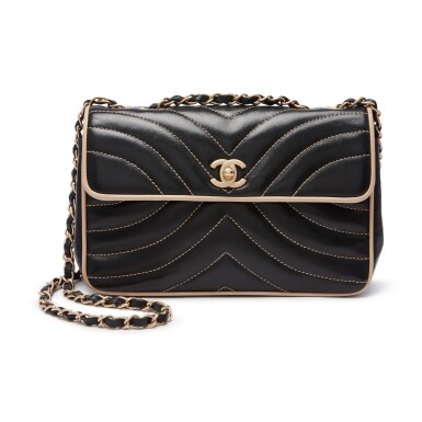 View full screen - View 1 of Lot 8570. Black Chevron Flap Bag in Quilted Lambskin Leather with Gold tone Hardware, 2014.