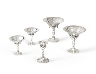 View full screen - View 1 of Lot 23. Two pairs of silver cups and one small silver candlestick, Jensen, Copenhagen, modern | Deux paires de coupes en argent et un petit flambeau en argent par Jensen, Copenhague, moderne.
