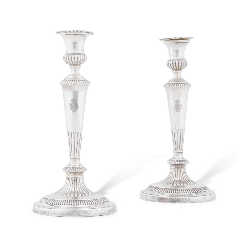 View full screen - View 1 of Lot 7. A pair of George III silver candlesticks, John Roberts & Co., Sheffield, 1806.