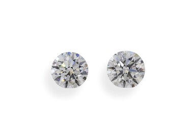 View full screen - View 1 of Lot 13. A Pair of 1.01 and 1.00 Carat Round Diamonds, E Color, VVS2 Clarity.