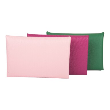 View full screen - View 1 of Lot 83. Hermès Set of Three Calvi Card Cases of Chevre Leather: Rose Sakura, Rose Pourpre, Vert Vertigo.
