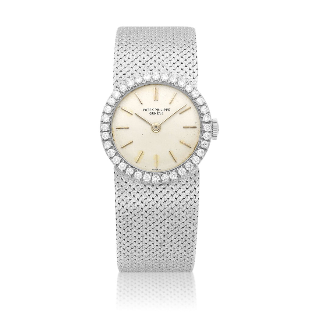 View full screen - View 1 of Lot 8775. Reference 3276 | A white gold and diamond-set bracelet watch, Circa 1970 | 百達翡麗 | 型號3276 | 白金鑲鑽石鏈帶腕錶,約1970年製.