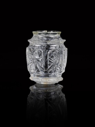 View full screen - View 1 of Lot 90. A Fatimid carved rock crystal bottle, Egypt, late 10th-early 11th century.