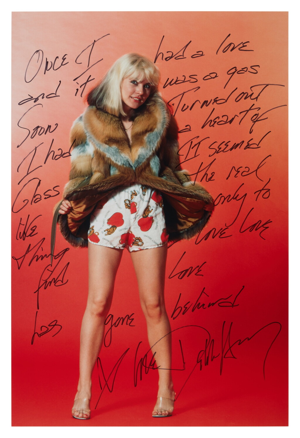 View full screen - View 1 of Lot 70. Debbie Harry | A signed poster with the lyrics to "Heart of Glass".