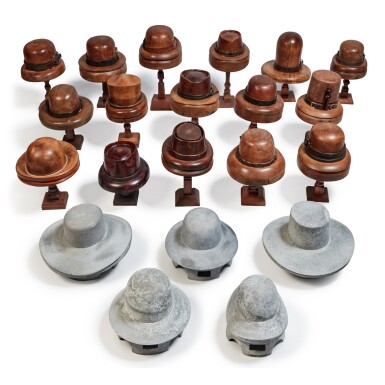 View full screen - View 1 of Lot 34. A Collection of Cast-Iron and Carved Wood Hat Molds, 19th Century .