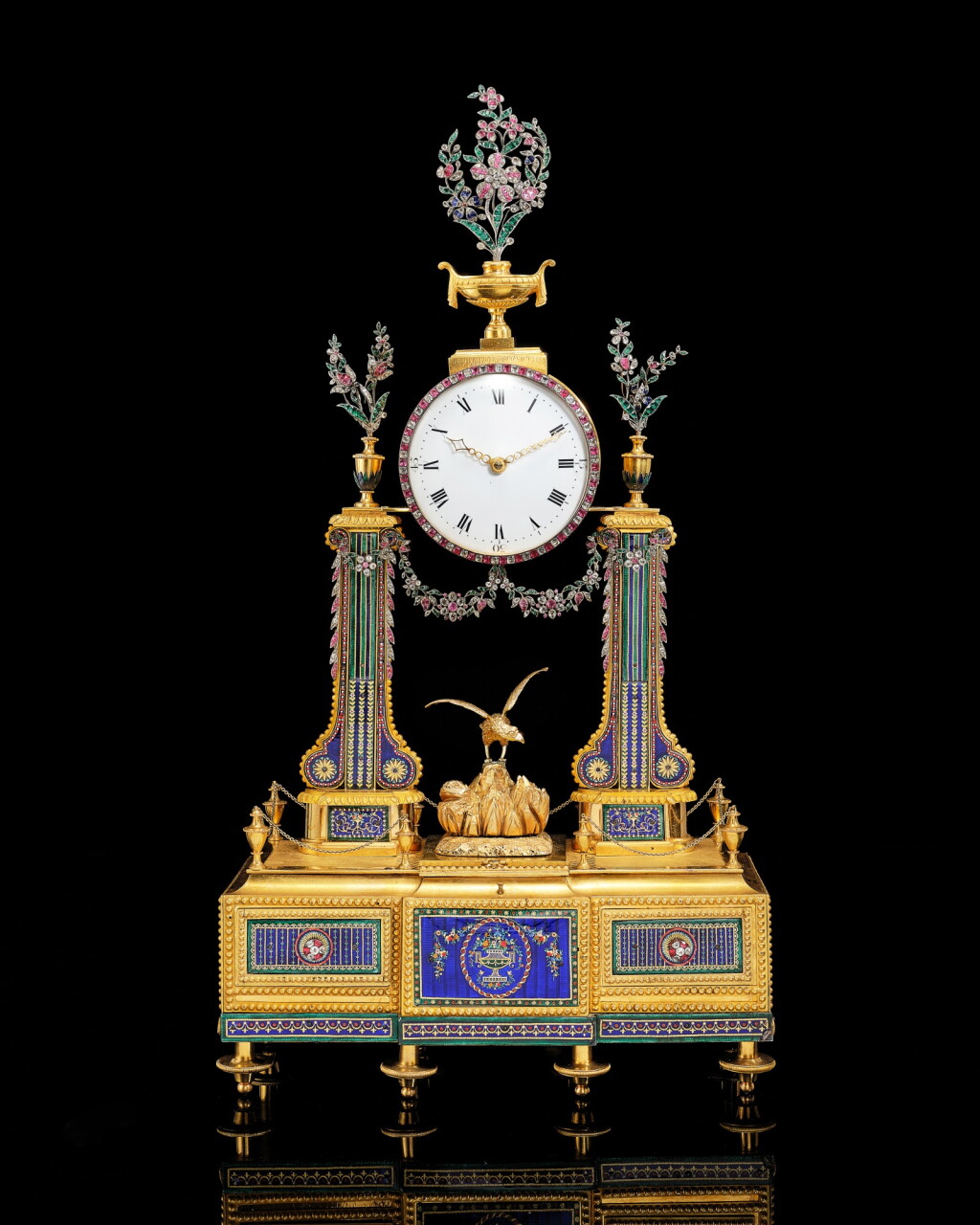 View full screen - View 1 of Lot 2259. A fine Swiss ormolu, enamel-mounted and paste-set, striking and musical portico clock made in the form of a dressing table | Geroge III Period (1760-1820), Late 18th Century.