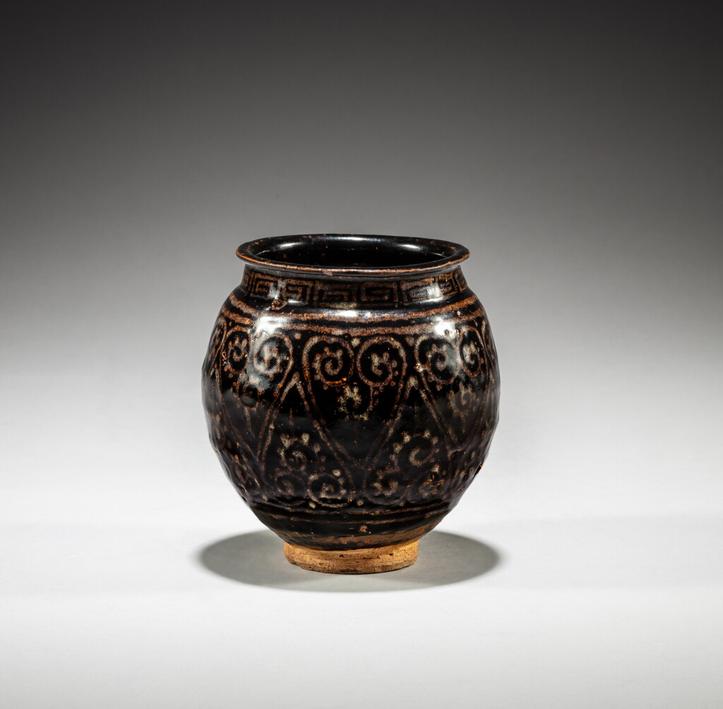 View full screen - View 1 of Lot 60. A small 'Jizhou' black-glazed ‘floral’ jar, Song dynasty | 宋 吉州窰黑釉花卉紋罐 .