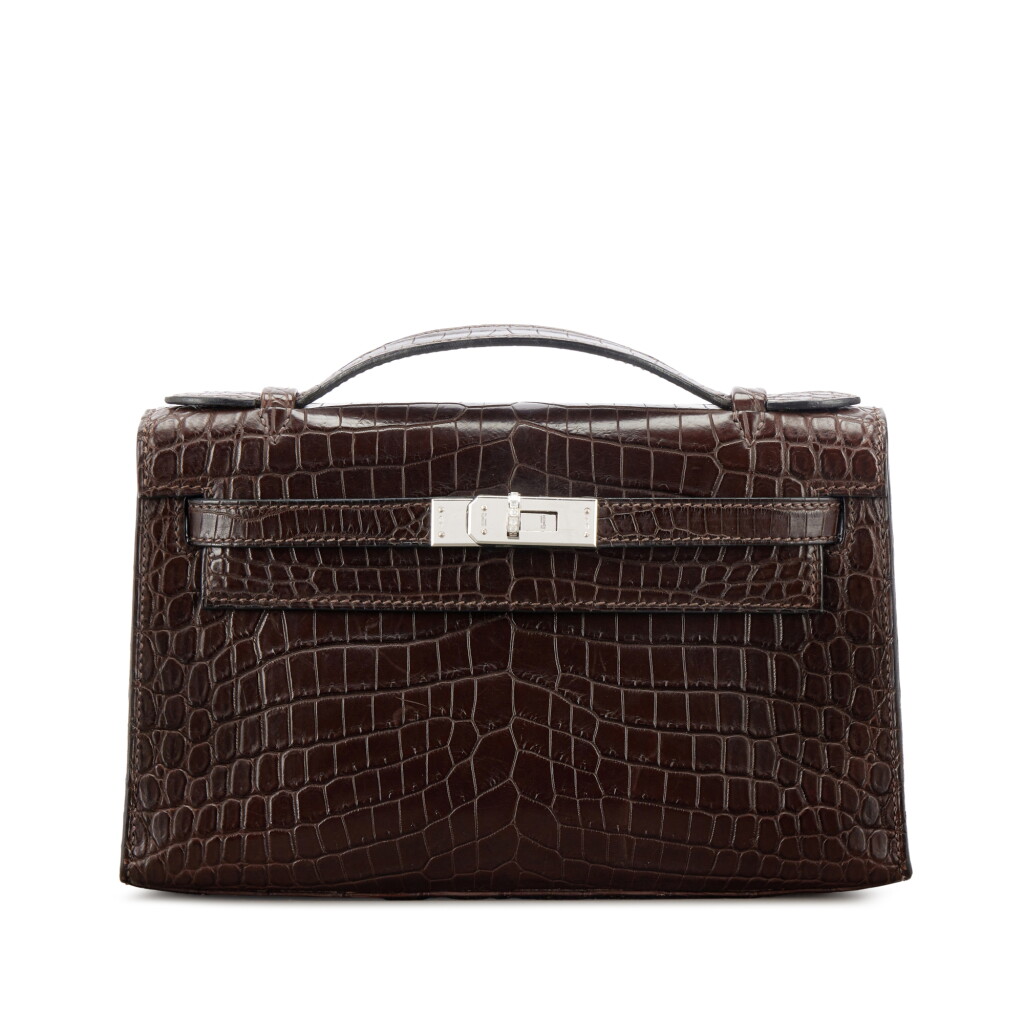 Voir en plein écran - Voir 1 du lot 529. Marron Fonce Matte Niloticus Crocodile Kelly Pochette 18K White Gold and Diamond Hardware, 2006.