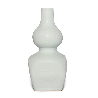 View full screen - View 1 of Lot 688. A rare anhua-decorated white-glazed 'phoenix' double-gourd vase, Mark and period of Jiajing | 明嘉靖 白釉暗刻鳳凰紋葫蘆方瓶 《大明嘉靖年製》款.