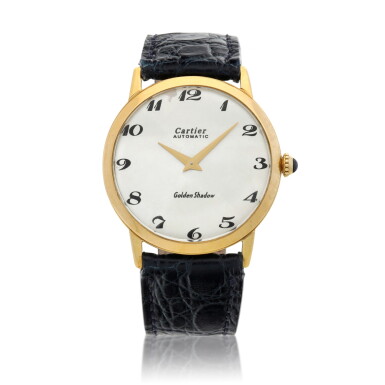 View full screen - View 1 of Lot 232. Golden Shadow, Retailed by Cartier: A yellow gold automatic wristwatch, Circa 1970.