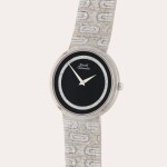 Reference 12343 A15 | A white gold bracelet watch with onyx and diamond-set dial | Circa 1975