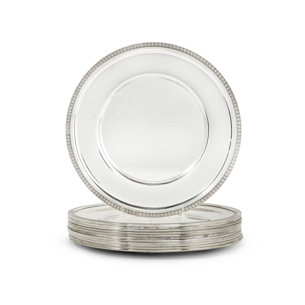 View full screen - View 1 of Lot 87. Twelve continental silver second course dishes or underplates, maker's mark a ship's wheel and standard 800, 20th century.