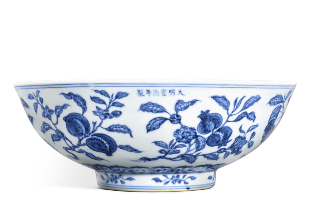 View full screen - View 1 of Lot 3848. A fine and rare blue and white ‘fruit’ bowl, Mark and period of Xuande | 明宣德 青花折枝瑞果紋盌 《大明宣德年製》款.