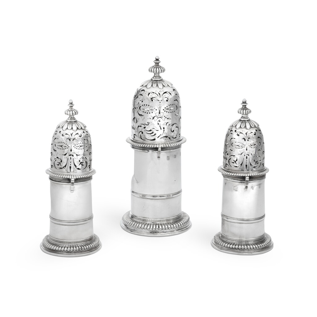 View full screen - View 1 of Lot 571. A Set of Three Queen Anne Silver Casters, Charles Adam, London, 1703.