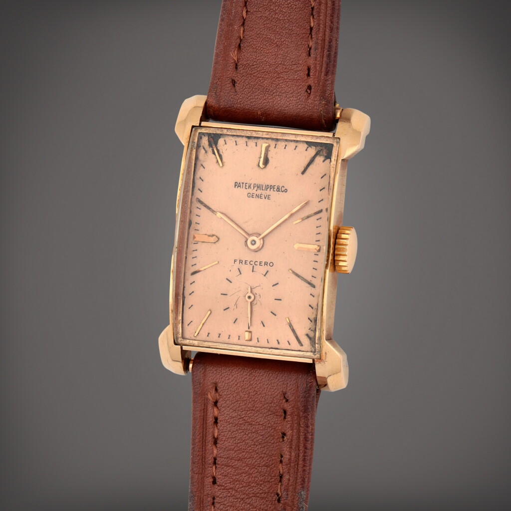 View full screen - View 1 of Lot 368. Reference 2403 | A pink gold wristwatch | Made in 1947.