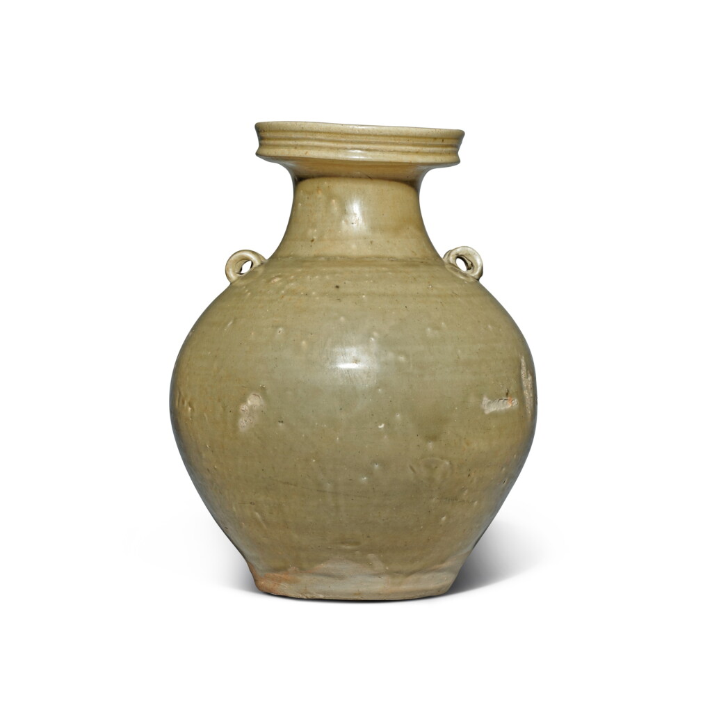 View full screen - View 1 of Lot 662. A rare 'Yue' celadon-glazed jar, Jin dynasty | 晉 越窰青釉雙繫盤口罐.